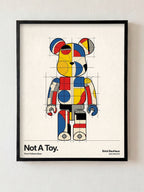 Not A Toy fine art print in black frame by HOOKD Studio
