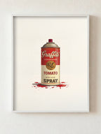 Framed artwork of a can labeled 'Graffiti Tomato Spray' on a white background